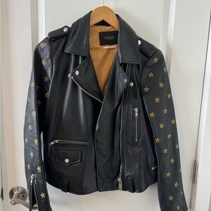 Black Leather Jacket with Gold Star Accents